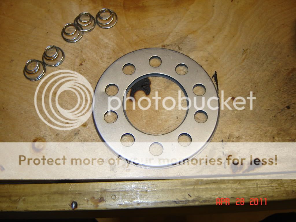 j&p cycle 5 stud clutch hub and tamer bearings. 6100020
